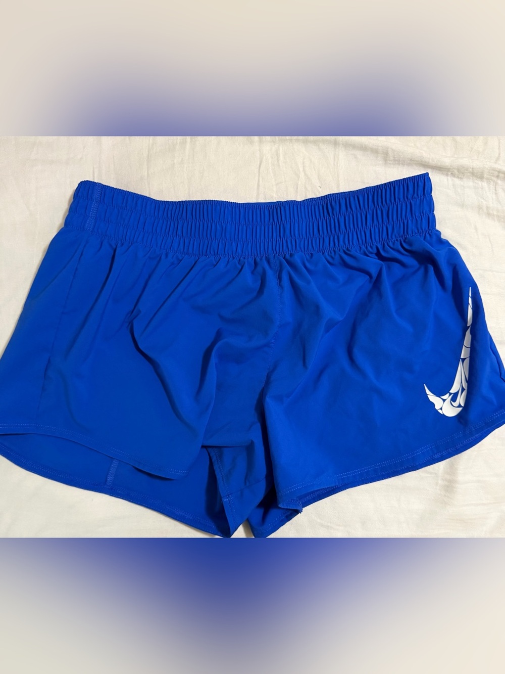 Nike Women’s Royal Blue Athletic Shorts with White Swoosh